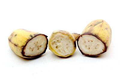 Close-up of fruits against white background