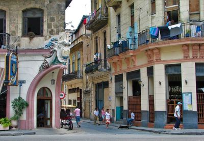 People walking on street in city