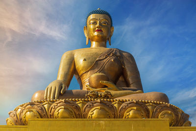 Buddha dordenma statue overlooking the city of thimphu, bhutan.