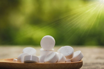 Close-up of white stack on table