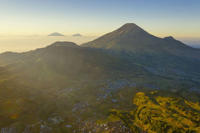 Scenic view of mountains against sky during sunset