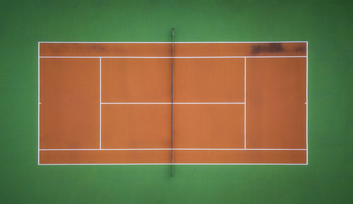 High angle view of orange on white wall