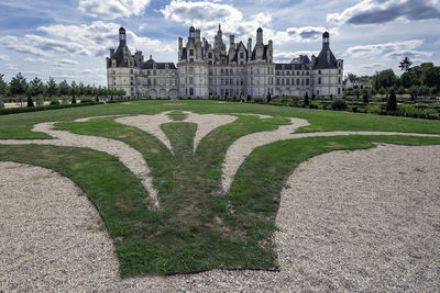 View of historical building in garden