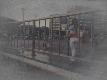 Woman standing in city