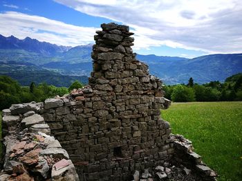 Stone wall with mountain in background