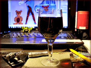 Close-up of beer glass on table