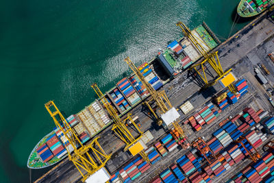 Aerial top view terminal shipping import and export international and shipping loading containers