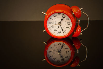 Close-up of clock on wall