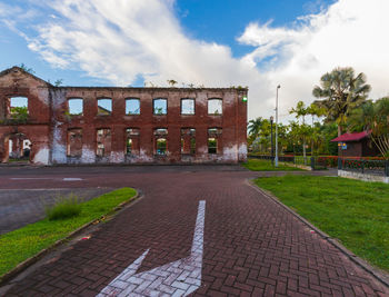 View of building against cloudy sky
