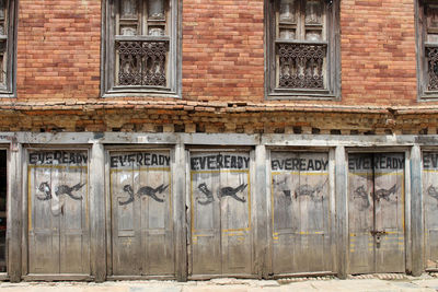 Graffiti on wall of old building