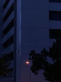Low angle view of modern building at night