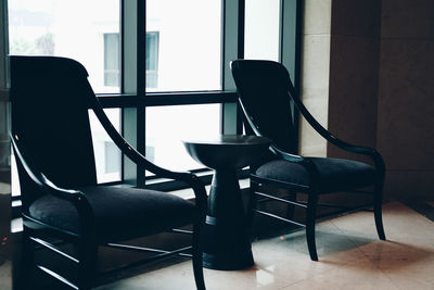 Empty chairs and tables at home