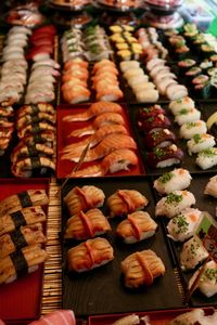 High angle view of nigiri sushi for sale in trays