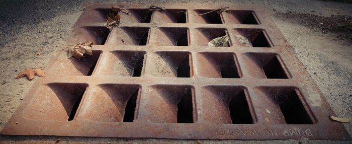 High angle view of metal grate