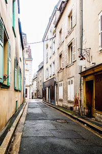 Street amidst buildings in city