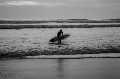 Man swimming in sea