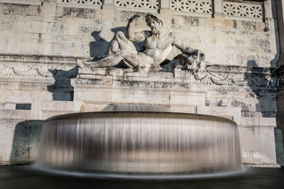 Statue of fountain in city