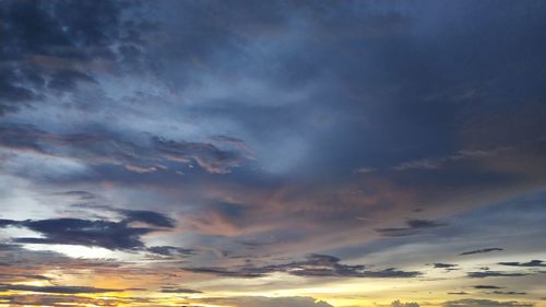 Low angle view of dramatic sky during sunset