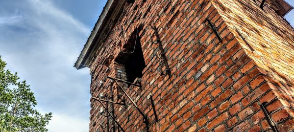 Low angle view of old building against sky