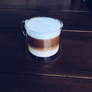 High angle view of coffee cup on table