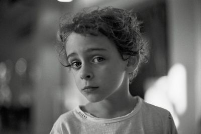 Close-up portrait of boy at home