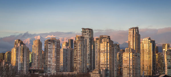 Modern buildings in city against sky