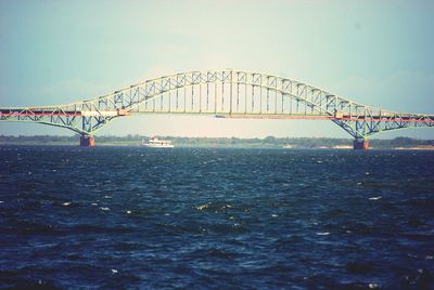 View of bridge over sea against sky