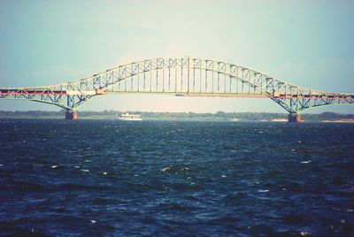 View of bridge over sea against sky