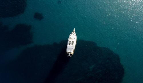 Aerial view of yacht sailing in sea