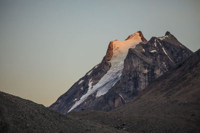 Alpenglow on glaciated mountain, auyuittuq national park
