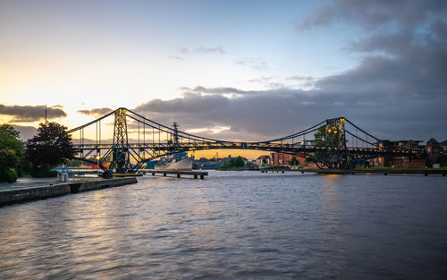 View of suspension bridge over river