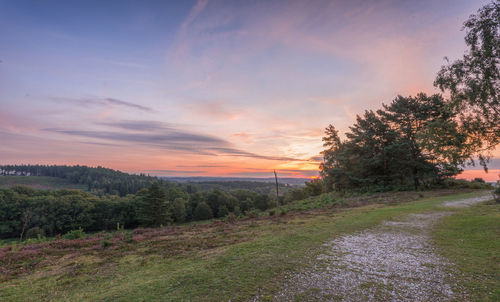 Scenic view of landscape against sky during sunset