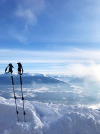 Low angle view of snow covered mountain against sky