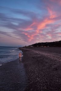 Scenic view of sea at sunset