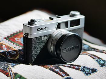 Close-up of camera on table