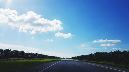 Empty road against sky