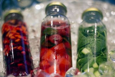 Close-up of fruit juices in bottles
