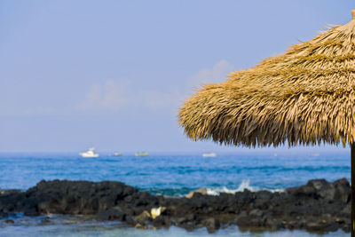 Scenic view of sea against blue sky