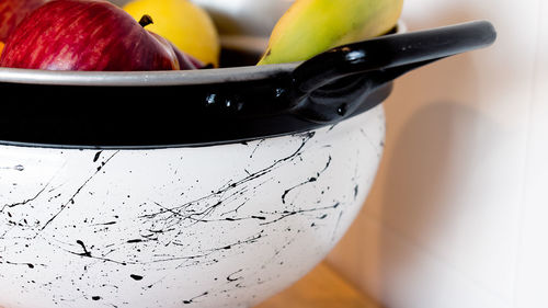 Close-up of fruits in bowl on table