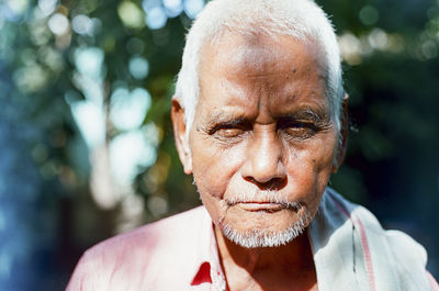 Portrait of senior man outdoors