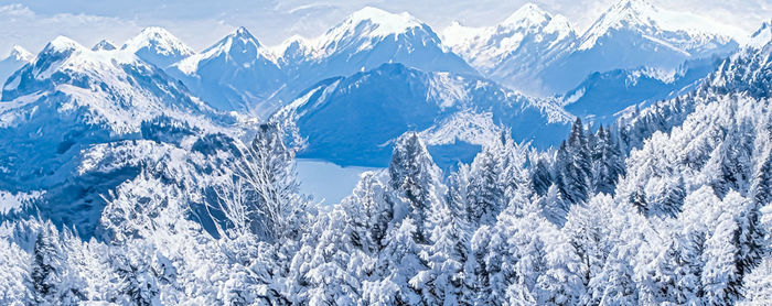 Scenic view of snow covered mountains