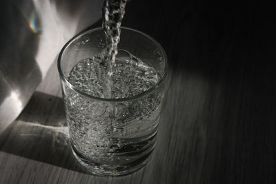 Close-up high angle view of water in glass on table