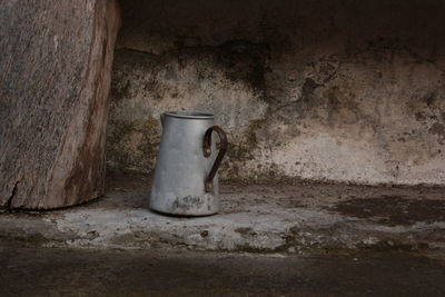 Rusty pipe in abandoned room