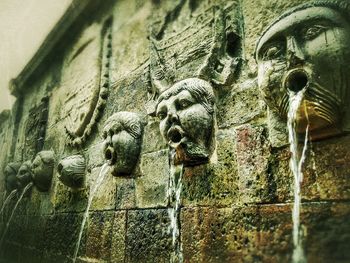 Low angle view of stone wall