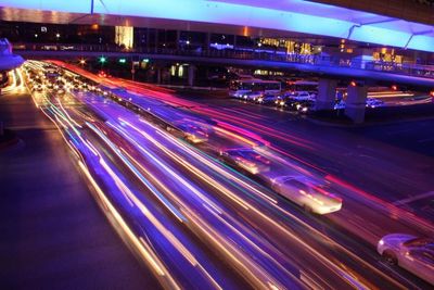 Light trails on city street at night