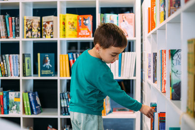 Full length of boy standing at home