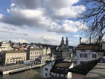 High angle view of buildings in city against sky