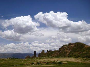 View of landscape against cloudy sky