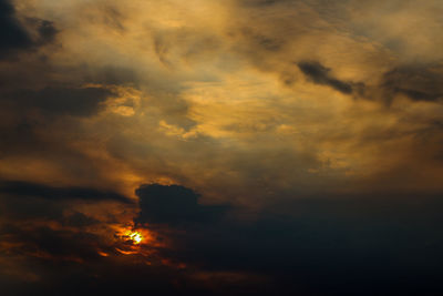 Low angle view of dramatic sky during sunset