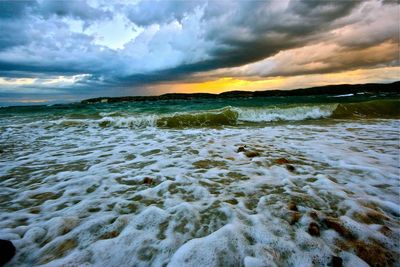 Scenic view of sea against sky during sunset